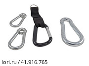 Альпинистские карабины на белом фоне. Climber carabiners on a white background. Стоковое фото, фотограф Татьяна Д / Фотобанк Лори