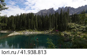 Beautiful lake and mountain view in Dolomites, Lago di Carezza, Italy. Стоковое видео, видеограф Яков Филимонов / Фотобанк Лори