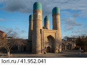 Madrasah of Khalif Niyaz-kul (Chor Minor) is a Central Asian madrasah in the historical center of Bukhara on a sunny day, Bukhara, Uzbekistan. Стоковое фото, фотограф Ula Ulachka / Фотобанк Лори
