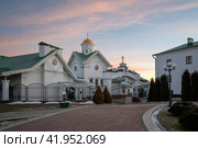 View of the Church of St. Cyril of Turov and All the Holy Intercessors of the Belarusian people - the house church of the Minsk Theological Academy on a winter morning, Minsk, Belarus. Стоковое фото, фотограф Ula Ulachka / Фотобанк Лори