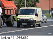 Автомобиль службы инкассации. Кремлевская набережная. Москва (2014 год). Редакционное фото, фотограф lana1501 / Фотобанк Лори