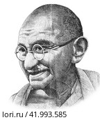 Mahatma Gandhi (1869-1948). Portrait from indian rupee banknote. Стоковое фото, фотограф FotograFF / Фотобанк Лори