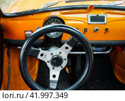 WERDER (HAVEL), GERMANY - MAY 20, 2023: The interior of a city car Fiat Abarth 695 SS. Oldtimer - Festival Werder Classics 2023. Редакционное фото, фотограф Sergey Kohl / Фотобанк Лори