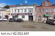 Torzhok, Russia - July 12, 2022: Provincial Russian town of Torzhok in summer sunny day. Old buildings at the embankment of the Tvertsa river. Редакционное видео, видеограф FotograFF / Фотобанк Лори