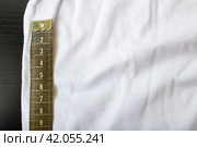 Measuring tape on white fabric close up. Стоковое фото, фотограф Аксенова Вера / Фотобанк Лори
