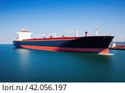 Transportation of petroleum products by sea. A gas tanker transports oil by sea. Стоковое AI-изображение, AI-художник Коханова Наталья / Фотобанк Лори