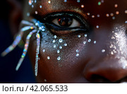 Close-Up of Womans Glittered Face Portrait. Стоковое AI-изображение, AI-художник Данил Руденко / Фотобанк Лори