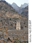 Abaev Tower, defensive structure of late Middle Ages in village of Kyunnyum, destroyed after deportation of Balkar people in spring, village of Upper Balkaria, Kabardino-Balkarian Republic, Russia (2023 год). Стоковое фото, фотограф Алексей Антипов / Фотобанк Лори