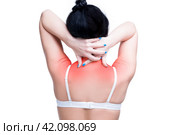 Young caucasian woman in bra with pain in shoulders and neck, ache in the human body, isolated on white background. Стоковое фото, фотограф Станислав Тарко / Фотобанк Лори