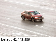 Renault Logan II car moving in the street. Редакционное фото, фотограф Константин Григорьев / Фотобанк Лори