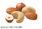 Cashew, hazelnut and almond isolated on white background. Nut mix. Стоковое фото, фотограф Катерина Ковалева / Фотобанк Лори