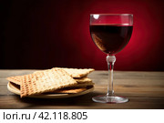 Matzah, red wine, kosher Jewish bread. Pesach holiday. Passover food Generative AI. Стоковое AI-изображение, AI-художник Светлана Лажко / Фотобанк Лори