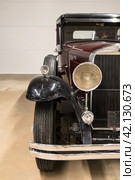 Cadillac V-16 Luxury Car close-up. Front and side view. Vertical photo. Стоковое фото, фотограф Регина Ерофеева / Фотобанк Лори
