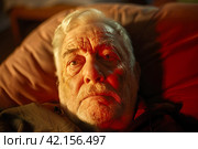 Портрет задумавшегося пожилого мужчины в кресле. Стоковое AI-изображение, AI-художник Щеголева Ольга / Фотобанк Лори