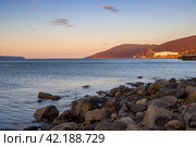 Morning seascape. View from the coast to the sea bay, mountains and cargo seaport. Beautiful landscape of the Nagaev Bay of the Sea of ​​Okhotsk. Sea port of the city of Magadan, Russian Far East. Стоковое фото, фотограф Андрей Степанов / Фотобанк Лори