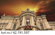 Opera Garnier (Garnier Palace) against the background of the sunset, Paris, France. (2024 год). Стоковое видео, видеограф Владимир Журавлев / Фотобанк Лори