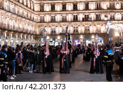Followers of religious brotherhoods participating Semana Santa procession in Salamanca (2022 год). Редакционное фото, фотограф Яков Филимонов / Фотобанк Лори