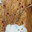 A white fluffy Angora cat with multicolored eyes lies on the table against a background of a tree decorated with hearts. Стоковое фото, фотограф Неведицына Елена / Фотобанк Лори