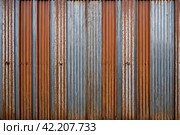 Old industrial corrugated iron industrial texture wall made of tin sheets. Grunge metal plate background. Copy ad text space. Стоковое AI-изображение, AI-художник Aleksandr Golubev / Фотобанк Лори