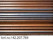 Old industrial corrugated iron industrial texture wall made of tin sheets. Grunge metal plate background. Copy ad text space. Стоковое AI-изображение, AI-художник Aleksandr Golubev / Фотобанк Лори