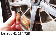 Damage to bearing unit in the washing machine. Demonstration by hand of rusty stains on the tank and bowl of the washing machine with the back cover removed. Service repair of household appliances. Стоковое видео, видеограф Юлия Петровская / Фотобанк Лори