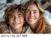 a woman and a boy are smiling for the camera. Стоковое AI-изображение, AI-художник Юрий Поздников / Фотобанк Лори