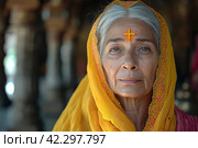 A Humble Woman with an Ashen Cross on Her Forehead: Spiritual State and Peace in a Sacred Temple. Стоковое AI-изображение, AI-художник Юрий Поздников / Фотобанк Лори