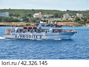 Protaras, Cyprus - Oct 10. 2019. Aphrodite II -Sightseeing ship with tourists sets sail. Редакционное фото, фотограф Володина Ольга / Фотобанк Лори