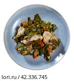 Fried piece of rib bone-in pork garnish with stewed beans and carrot. Стоковое фото, фотограф Яков Филимонов / Фотобанк Лори