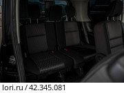 KRASNOYARSK, RUSSIA - July 17, 2023: Black Nissan Serena. Редакционное фото, фотограф Плотников Дмитрий / Фотобанк Лори