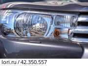 Headlight of an expensive off-road car close-up. Стоковое фото, фотограф Евгений Ткачёв / Фотобанк Лори