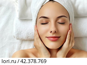 Beautiful woman's face in a spa salon. Cosmetic skin care procedures. Стоковое AI-изображение, AI-художник Ольга Яковенко / Фотобанк Лори