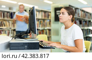 Young female European student studying with a computer. Стоковое фото, фотограф Яков Филимонов / Фотобанк Лори