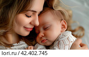A beautiful young mother and her little son are sleeping peacefully and cuddling up to each other. The concept of a happy childhood. Стоковое AI-изображение, AI-художник Ярославский Максим / Фотобанк Лори