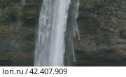 Falling water of Beautiful Seljalandsfoss waterfall Iceland. Стоковое видео, видеограф Igor Tichonow / Фотобанк Лори