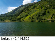 View of Lake Tumanly-Gel (Foggy Lake) in the valley of the Gonachkhir River on the territory of the Teberdinsky National Park on a sunny summer day, Dombay, Karachay-Cherkessia, Russia. Стоковое фото, фотограф Ula Ulachka / Фотобанк Лори