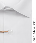 Button placket on a white classic men's shirt, close-up. Стоковое фото, фотограф Сергей Чайко / Фотобанк Лори