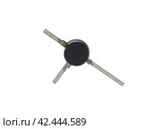Полупроводниковый транзистор на белом фоне. Transistor on a white background. Стоковое фото, фотограф Татьяна Д / Фотобанк Лори