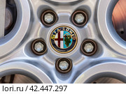 LINTHE, GERMANY - MAY 27, 2023: The aluminum rims of sports car Alfa Romeo 4C, close-up. Die Oldtimer Show 2023. Редакционное фото, фотограф Sergey Kohl / Фотобанк Лори