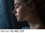 Side view closeup shot of Cinderella face. Generate ai. Стоковое AI-изображение, AI-художник Иван Рябоконь / Фотобанк Лори