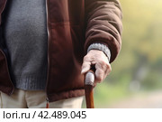 Senior man with walking cane. Generate ai. Стоковое AI-изображение, AI-художник Иван Рябоконь / Фотобанк Лори