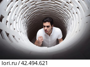 Confused man trapped in round maze. Generate ai. Стоковое AI-изображение, AI-художник Иван Рябоконь / Фотобанк Лори