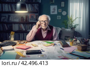Pensioner managing and calculating finances. Generate Ai. Стоковое AI-изображение, AI-художник Иван Рябоконь / Фотобанк Лори