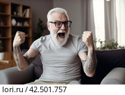 Jubilant senior man with raised tattooed hands. Generate ai. Стоковое AI-изображение, AI-художник Иван Рябоконь / Фотобанк Лори