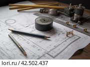 Technical drawings tools on work table. Generate Ai. Стоковое AI-изображение, AI-художник Иван Рябоконь / Фотобанк Лори