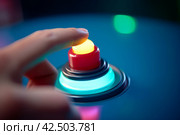 Finger pushes illuminated button. Generate ai. Стоковое AI-изображение, AI-художник Иван Рябоконь / Фотобанк Лори
