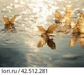 Golden butterflies on reflective sun lake water. Generate ai. Стоковое AI-изображение, AI-художник Иван Рябоконь / Фотобанк Лори