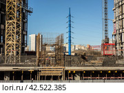 Строительная площадка. Новостройки Москвы - 26.03.2024. Жилой 28-этажный комплекс из монолитного железобетона - застройщик: ООО "СПЕЦИАЛИЗИРОВАННЫЙ ЗАСТРОЙЩИК "ТПУ "МИЧУРИНСКИЙ ПРОСПЕКТ", Москва, ЗАО, район Раменки, Мичуринский проспект, вл. 45. Генеральный подрядчик: China Railway Construction Corporation (CRCC). Редакционное фото, фотограф Iva Noel / Фотобанк Лори