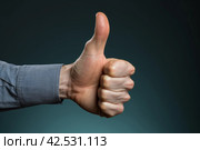 Gestural Thumb up hand city. Generate ai. Стоковое AI-изображение, AI-художник Иван Рябоконь / Фотобанк Лори