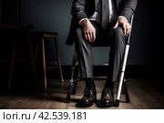 Limping Man injured leg using crutches. Generate Ai. Стоковое AI-изображение, AI-художник Иван Рябоконь / Фотобанк Лори